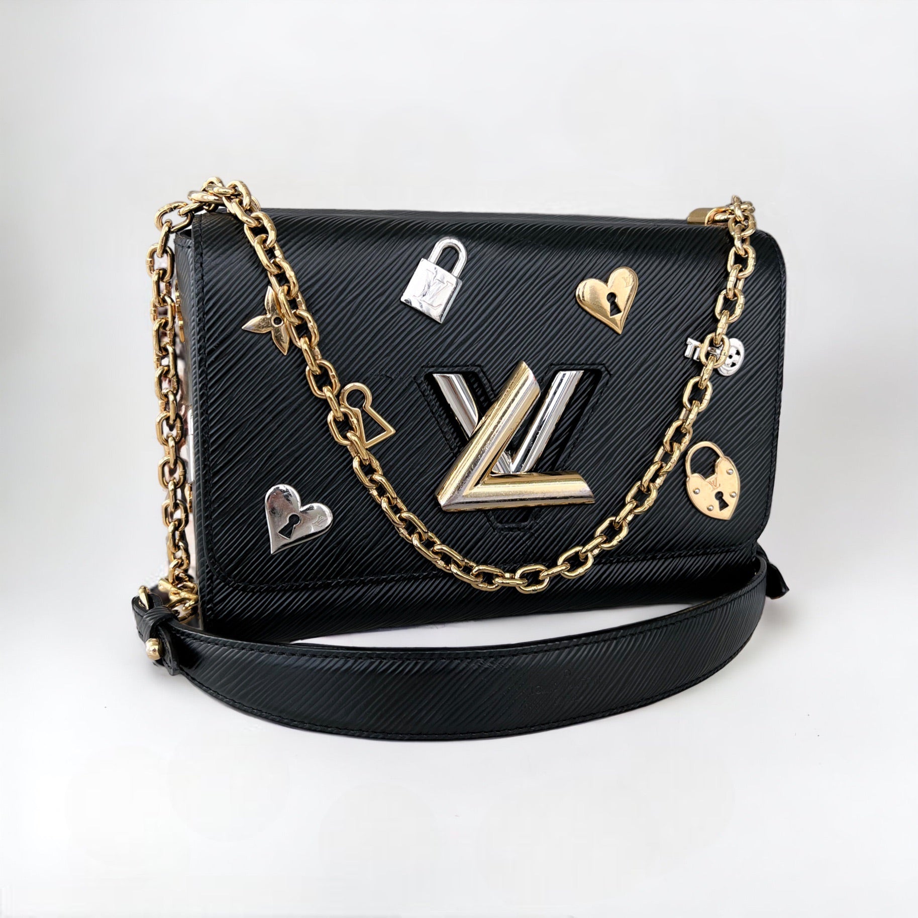 Louis Vuitton Epi Love Lock Twist MM - White Shoulder Bags, Handbags -  LOU765658